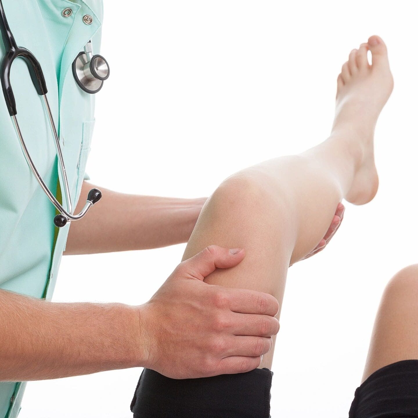 Doctor examining patient's knee.